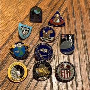 Apollo space mission hat pins.